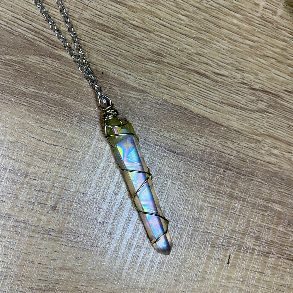 Sterling silver Handmade wire wrapped aqua aura quartz.